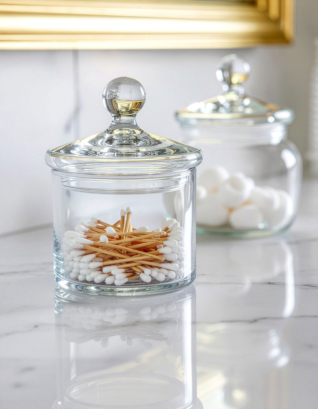 Apothecary jars for cotton balls - 30 bathroom clutter-free ideas
