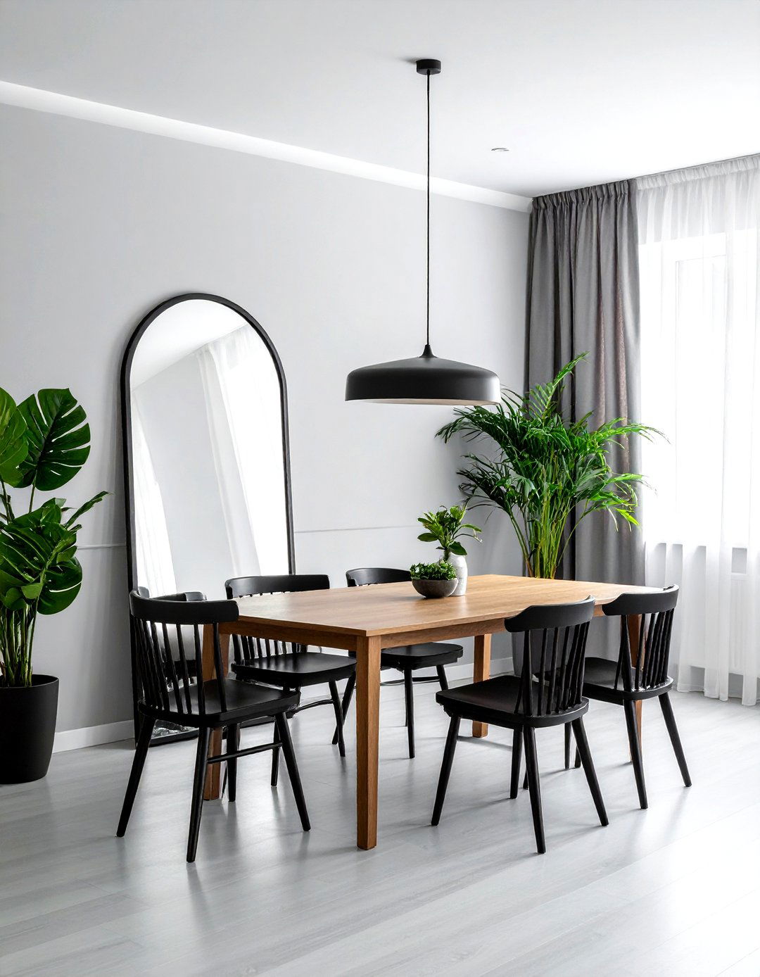 Arched black frame mirror - 30 leaning mirror dining room ideas