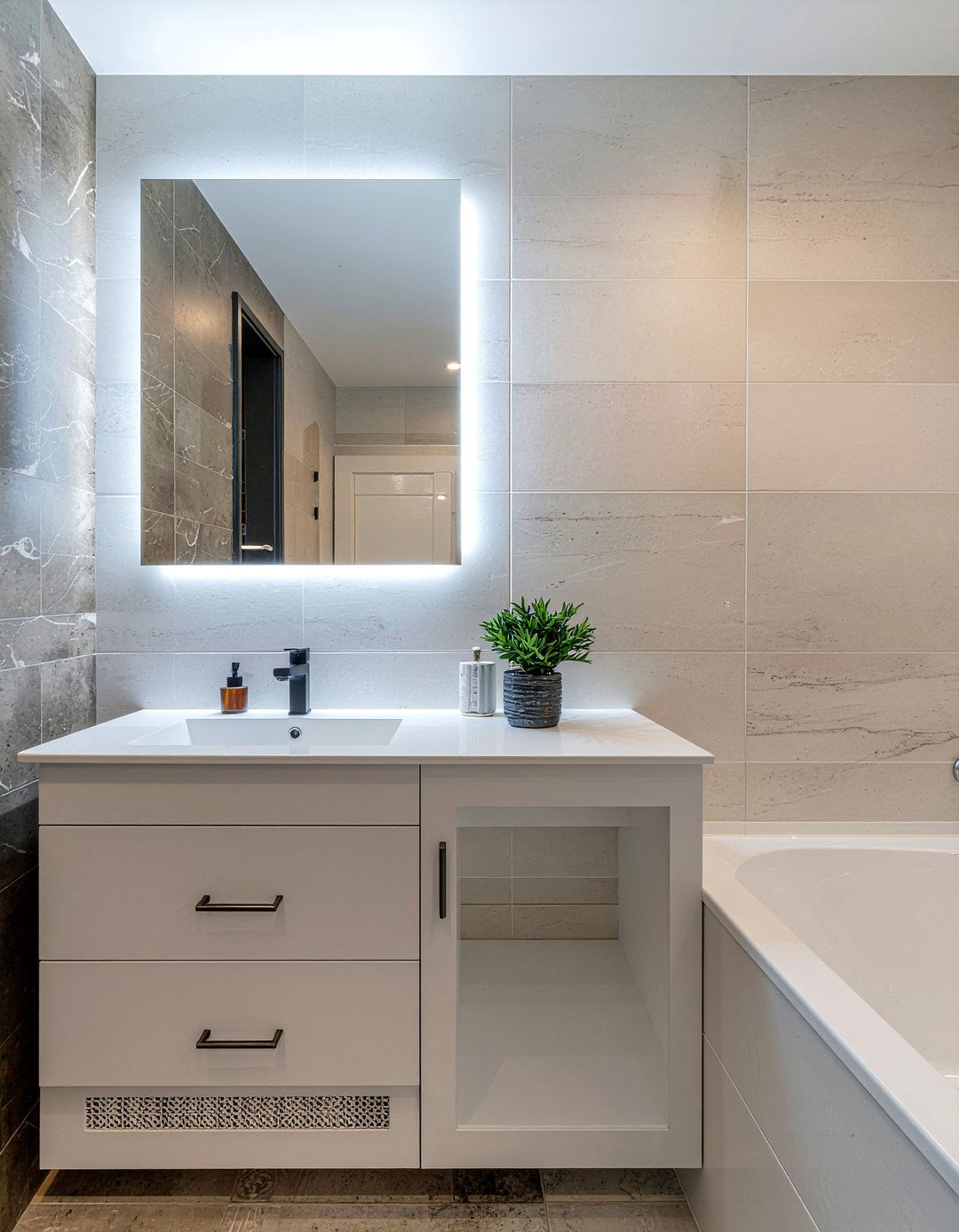 Backlit Mirror - 30 small bathroom remodel ideas