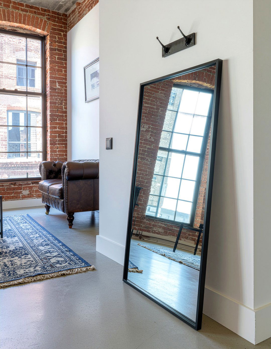 Black Metal Frame Mirror - 30 living room entryway ideas
