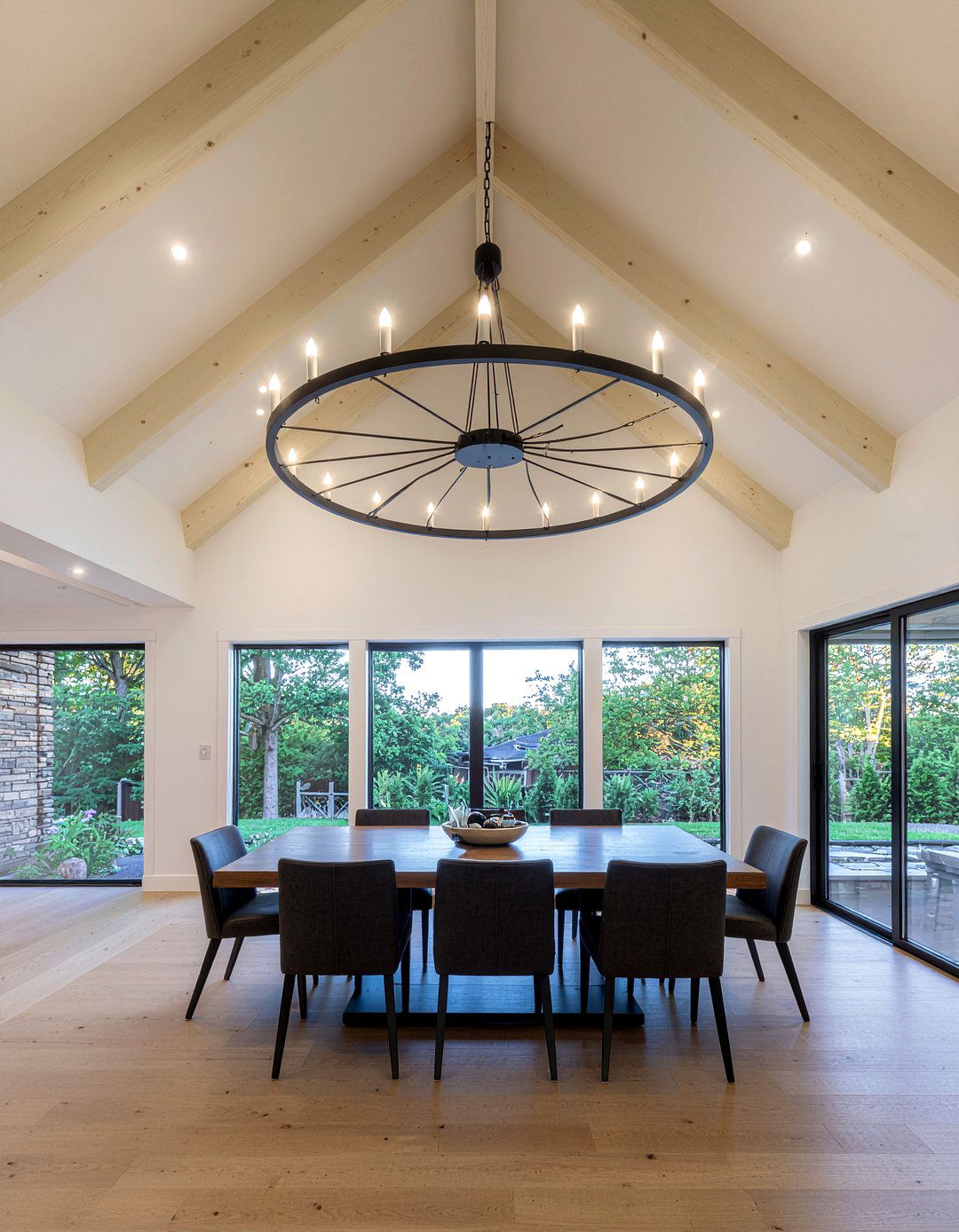 Black Wagon Wheel Light - 30 modern chandelier dining room ideas