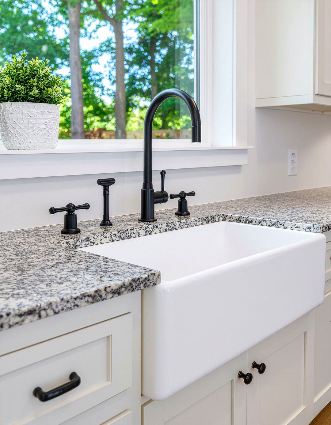 Black bridge faucet for kitchen sink - 30 black kitchen hardware ideas