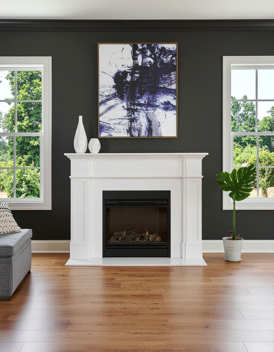 Black fireplace mantel - 30 living room mantel styling ideas