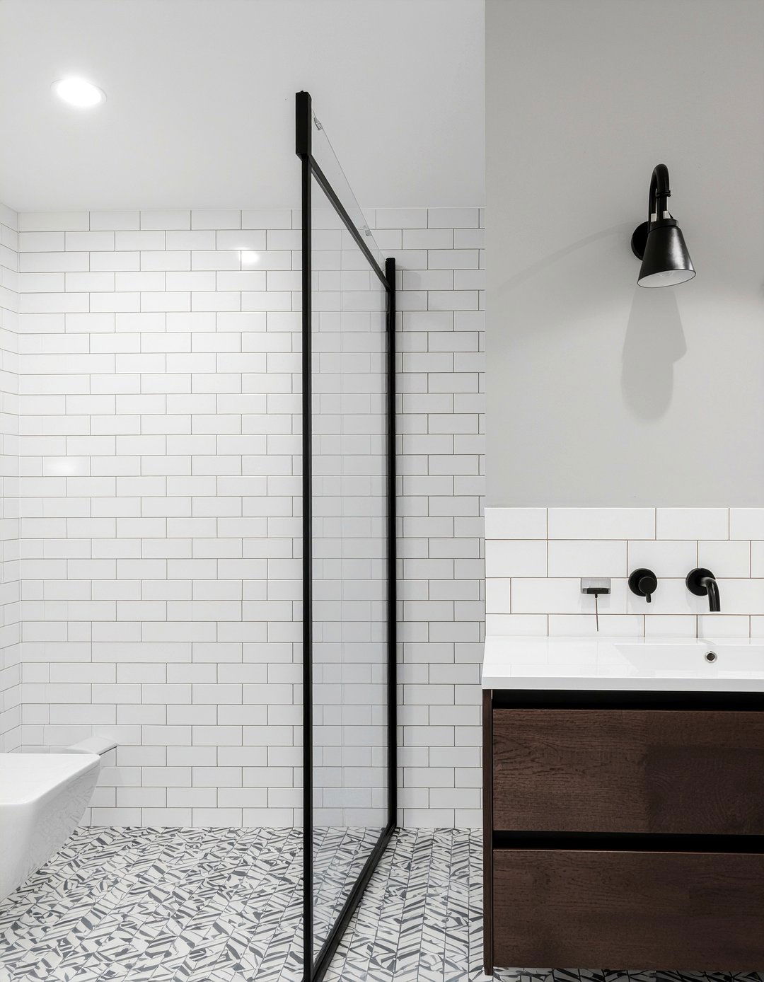Black matte sconce - 30 bathroom lighting statement ideas