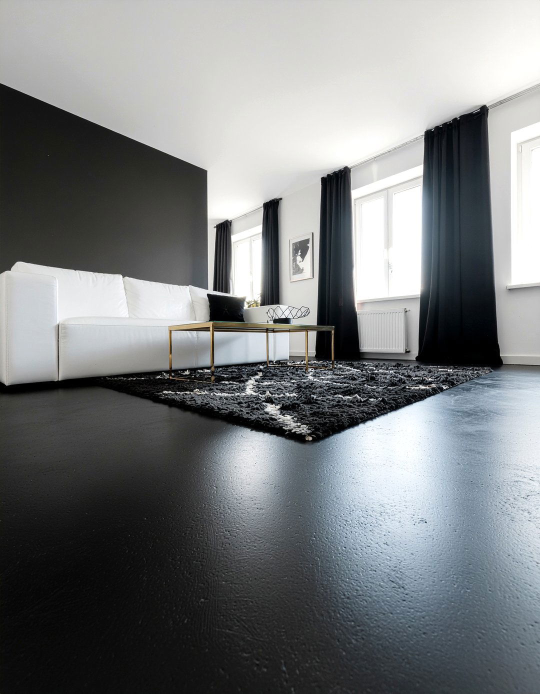 Black polished concrete floor - 30 polished concrete living room ideas