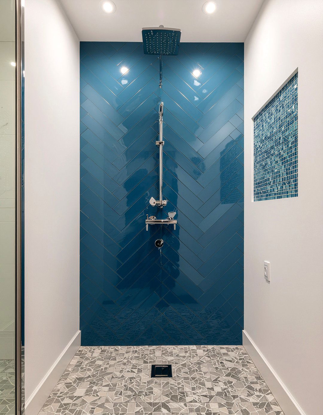 Blue herringbone shower wall - 30 herringbone tile bathroom ideas