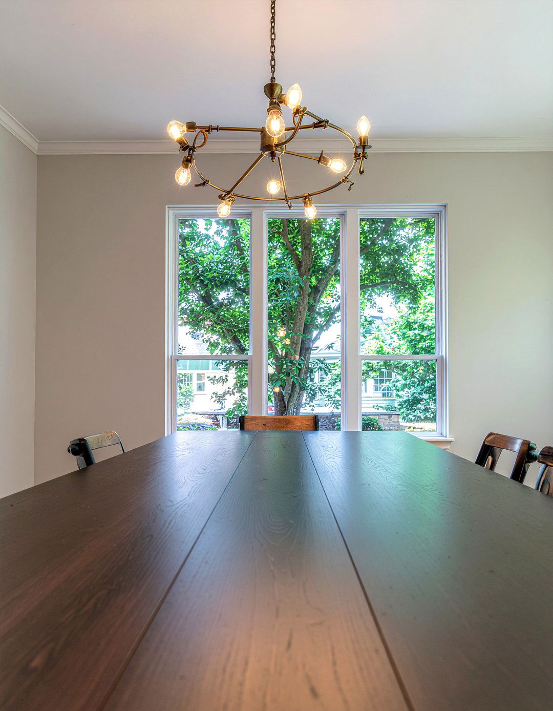 Brass Light Fixture - 30 ambient dining room ideas