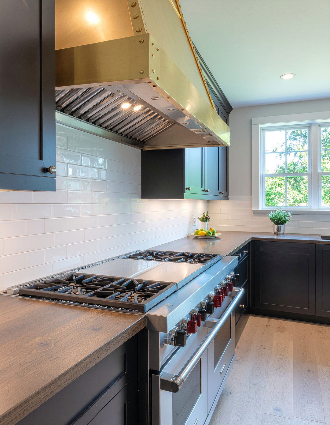 Brass Range Hood - 30 brass accent kitchen ideas