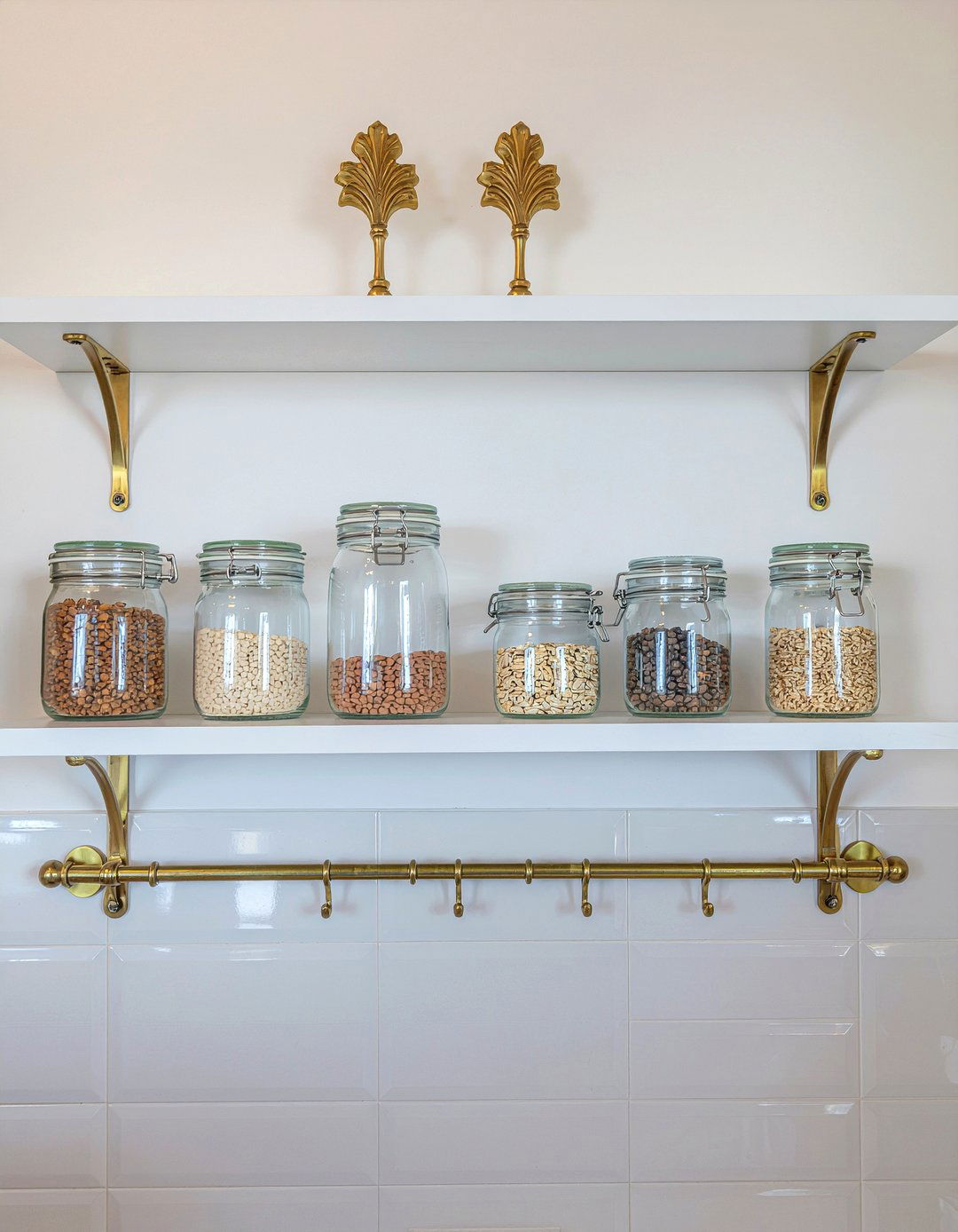 Brass shelving brackets on white walls - 30 mixed metal kitchen ideas
