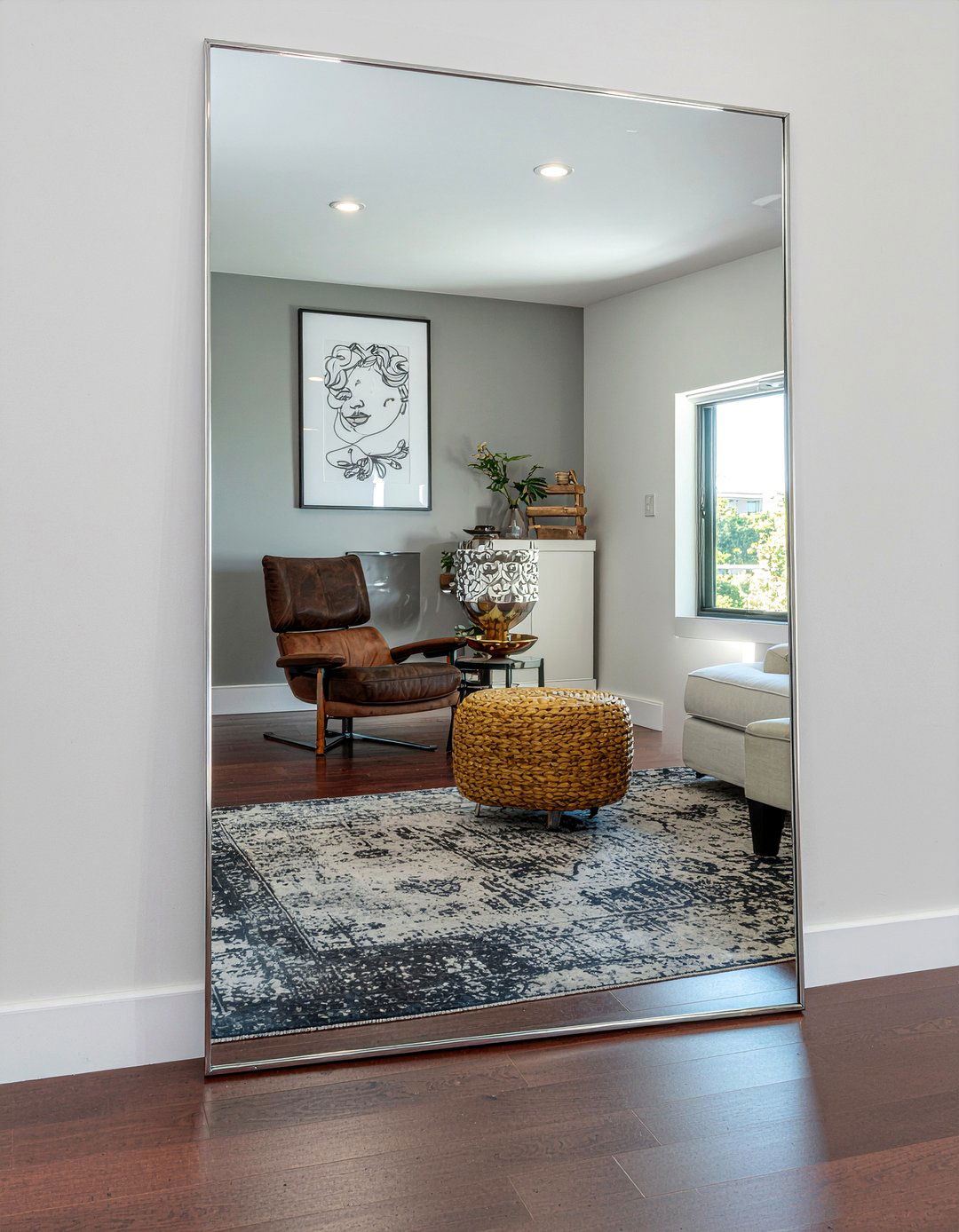 Chrome mirror frame - 30 chrome accent living room ideas