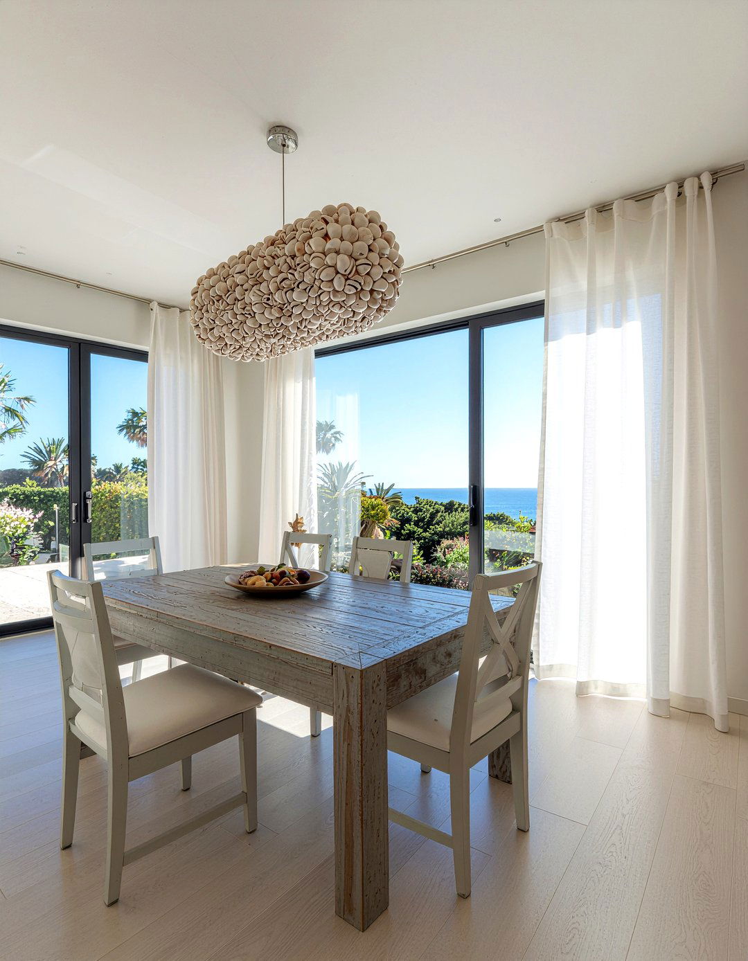 Coastal Shell Chandelier Dining Room - 30 beach house dining room ideas