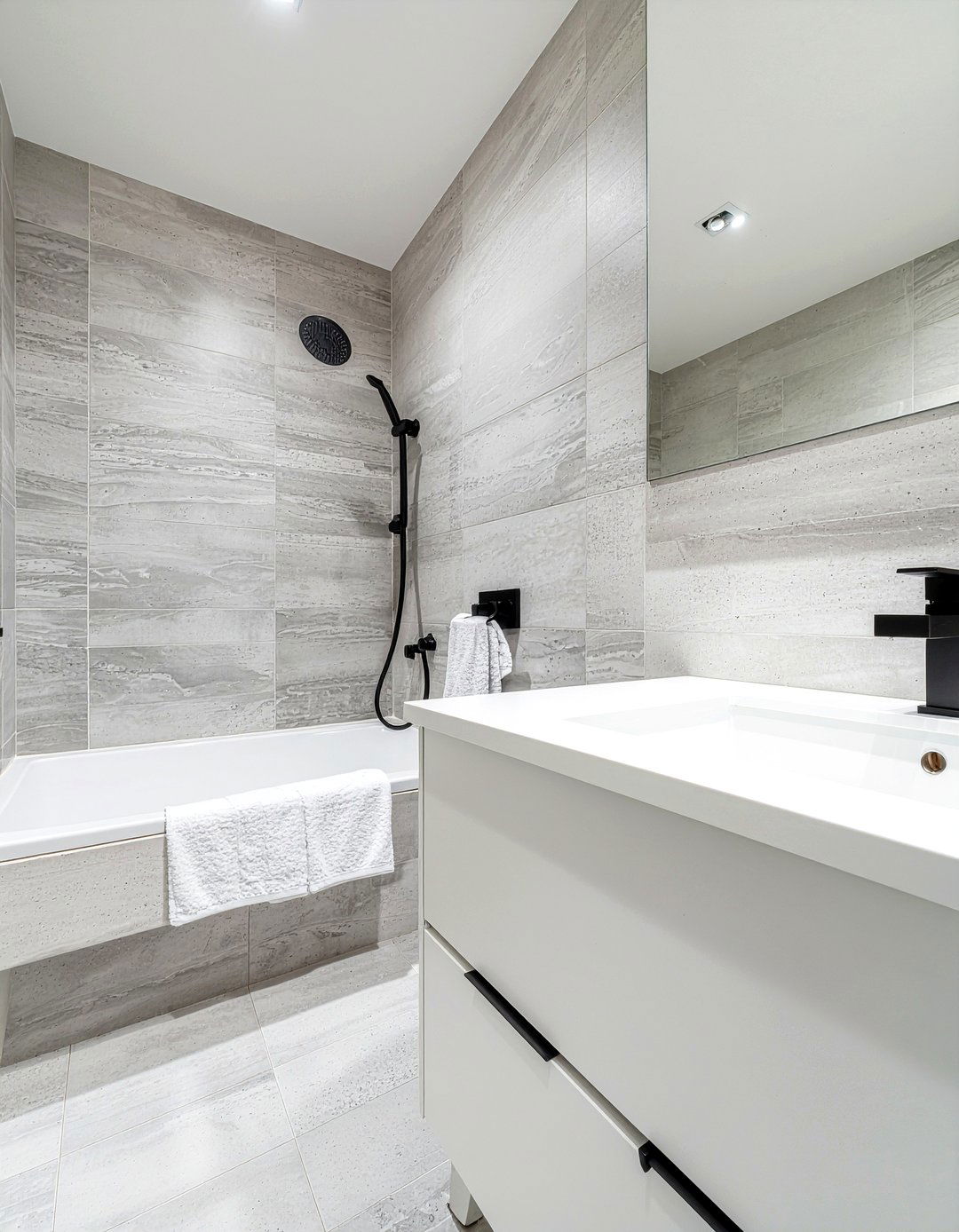 Contemporary L shaped bathroom with black fixtures - 30 L-shaped bathroom layout ideas