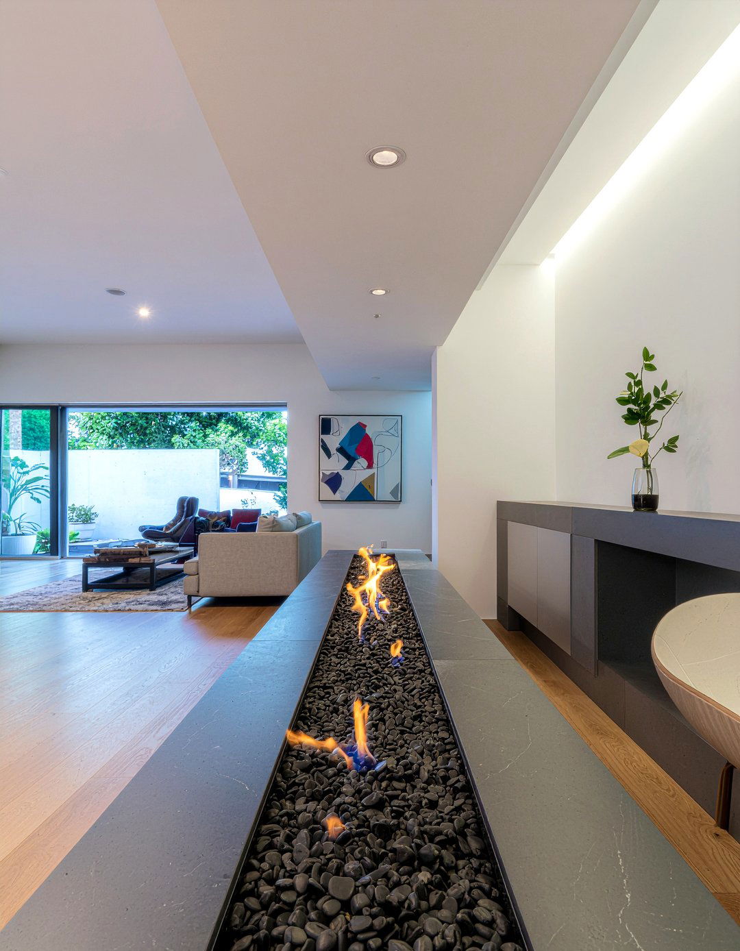 Contemporary linear fireplace - 30 living room double sided fireplace ideas