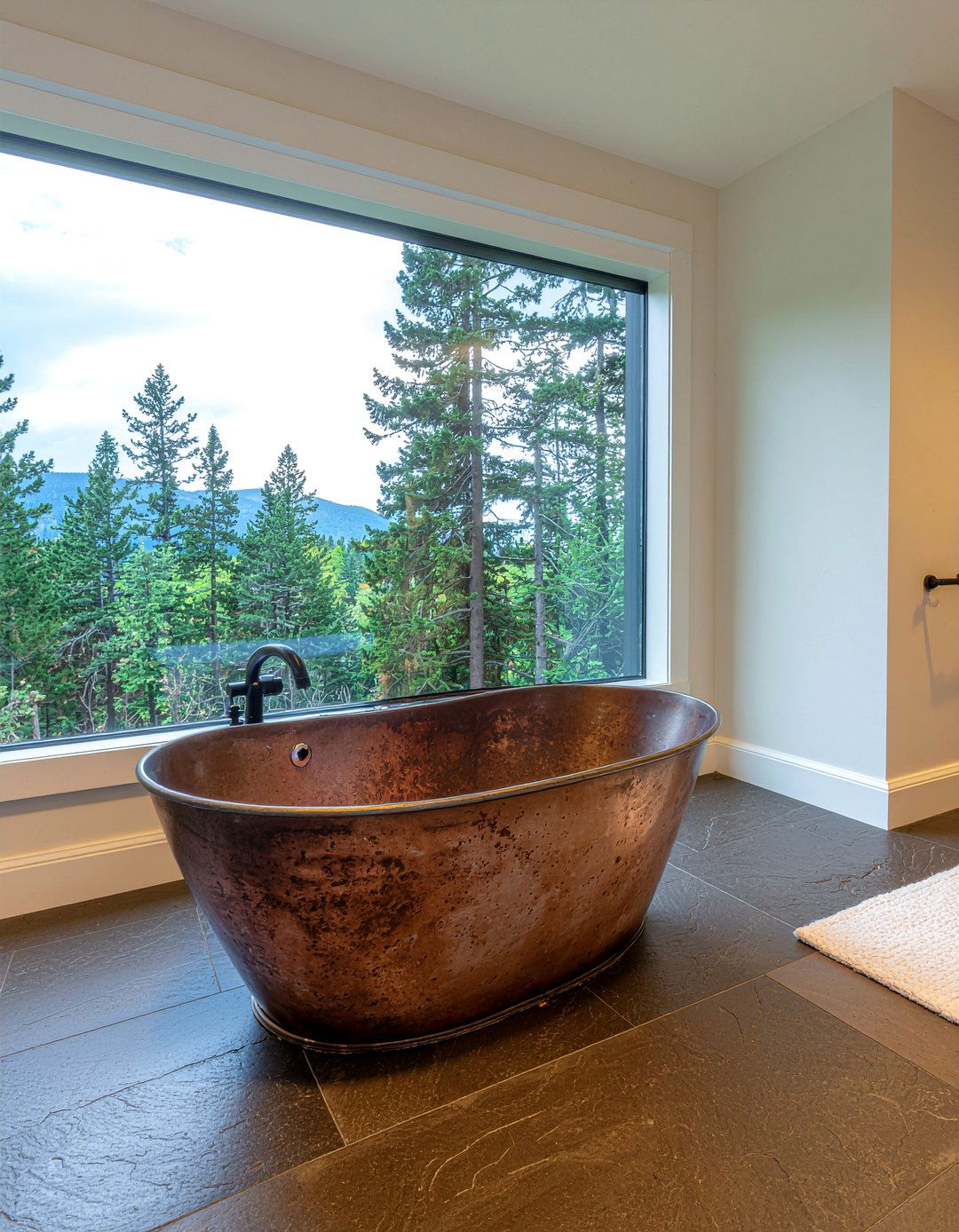 Copper soaking tub - 30 mountain bathroom ideas