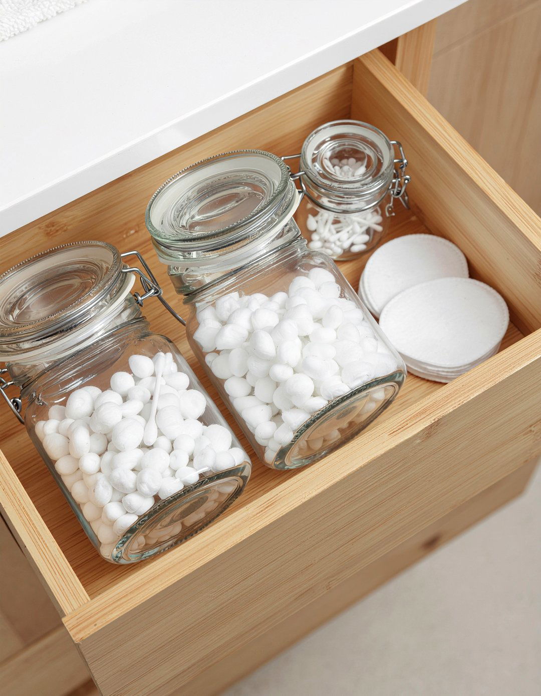 Cotton Ball Containers - 30 bathroom drawer organizer ideas