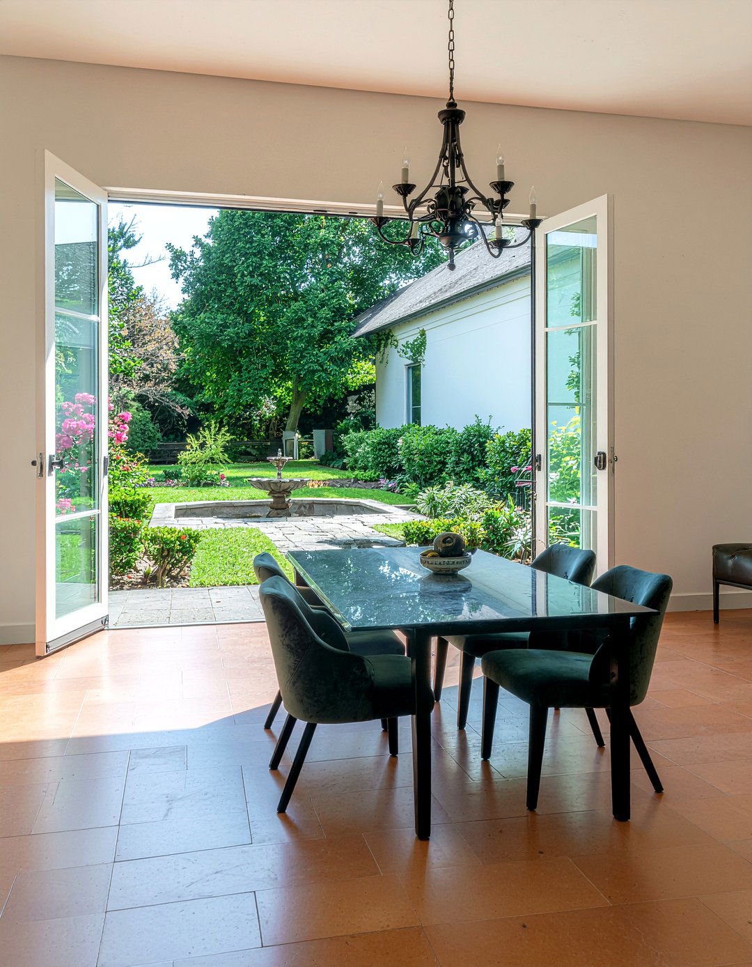 Courtyard view dining room - 30 New Orleans dining room ideas