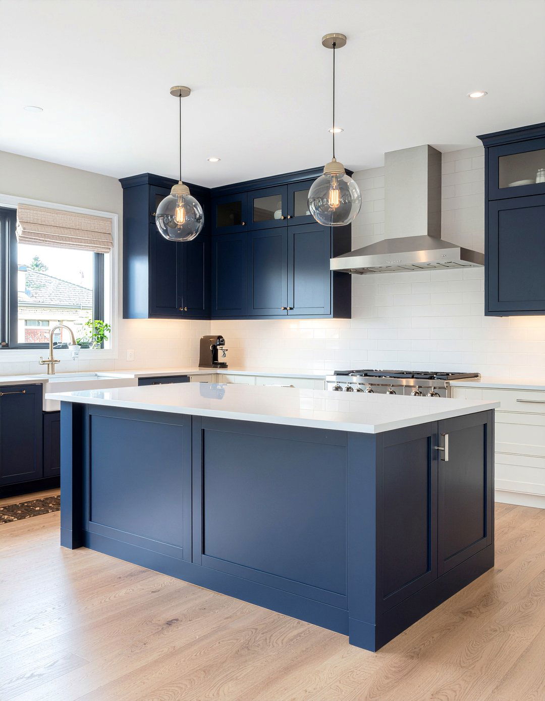 Cream kitchen with navy blue island - 30 cream kitchen ideas