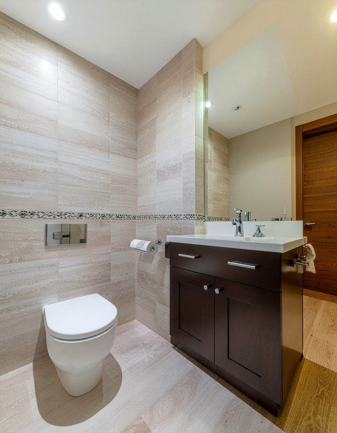 Dark wood cabinet - 30 over toilet storage ideas