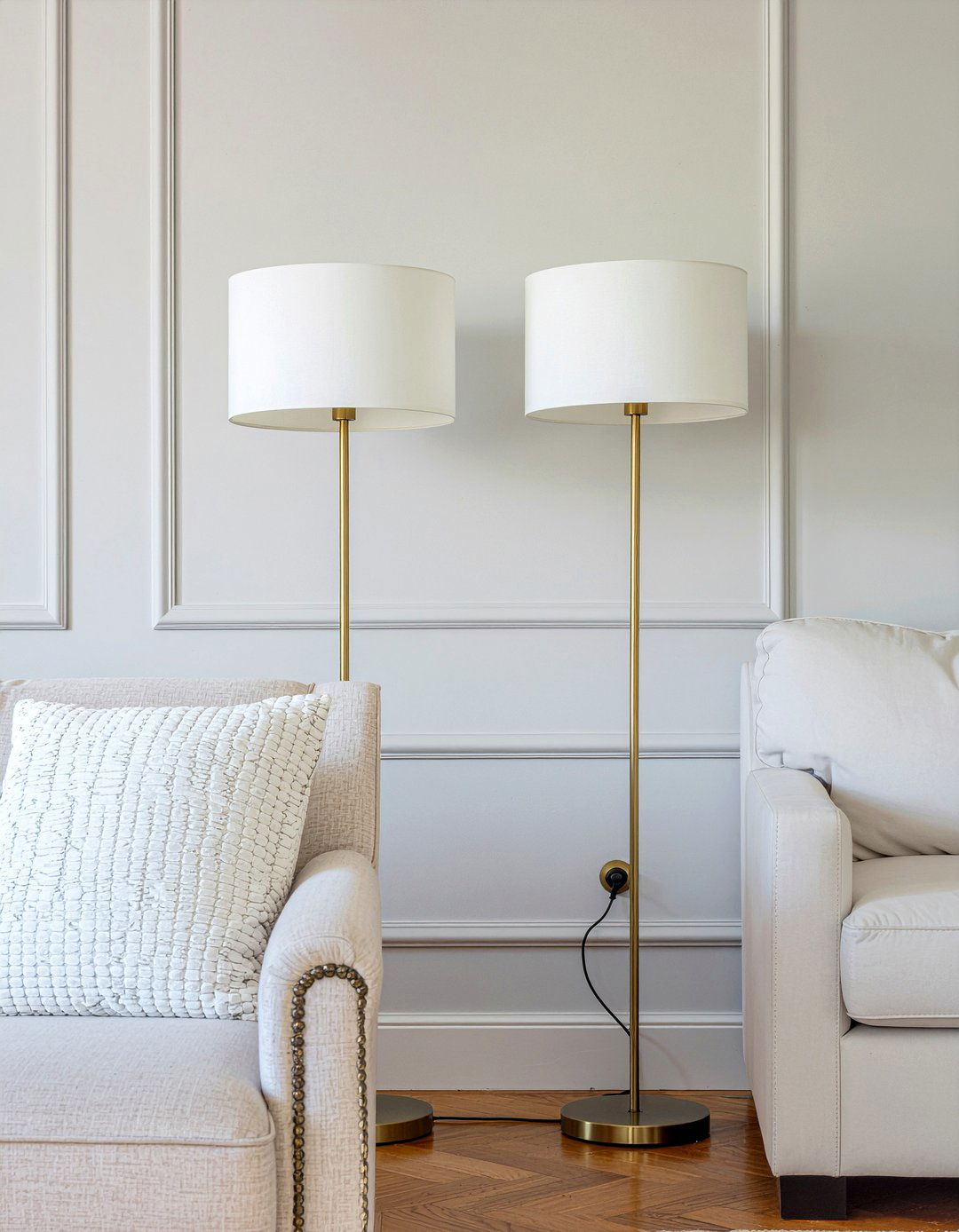 Double floor lamps behind sofa - 30 living room light fixture placement