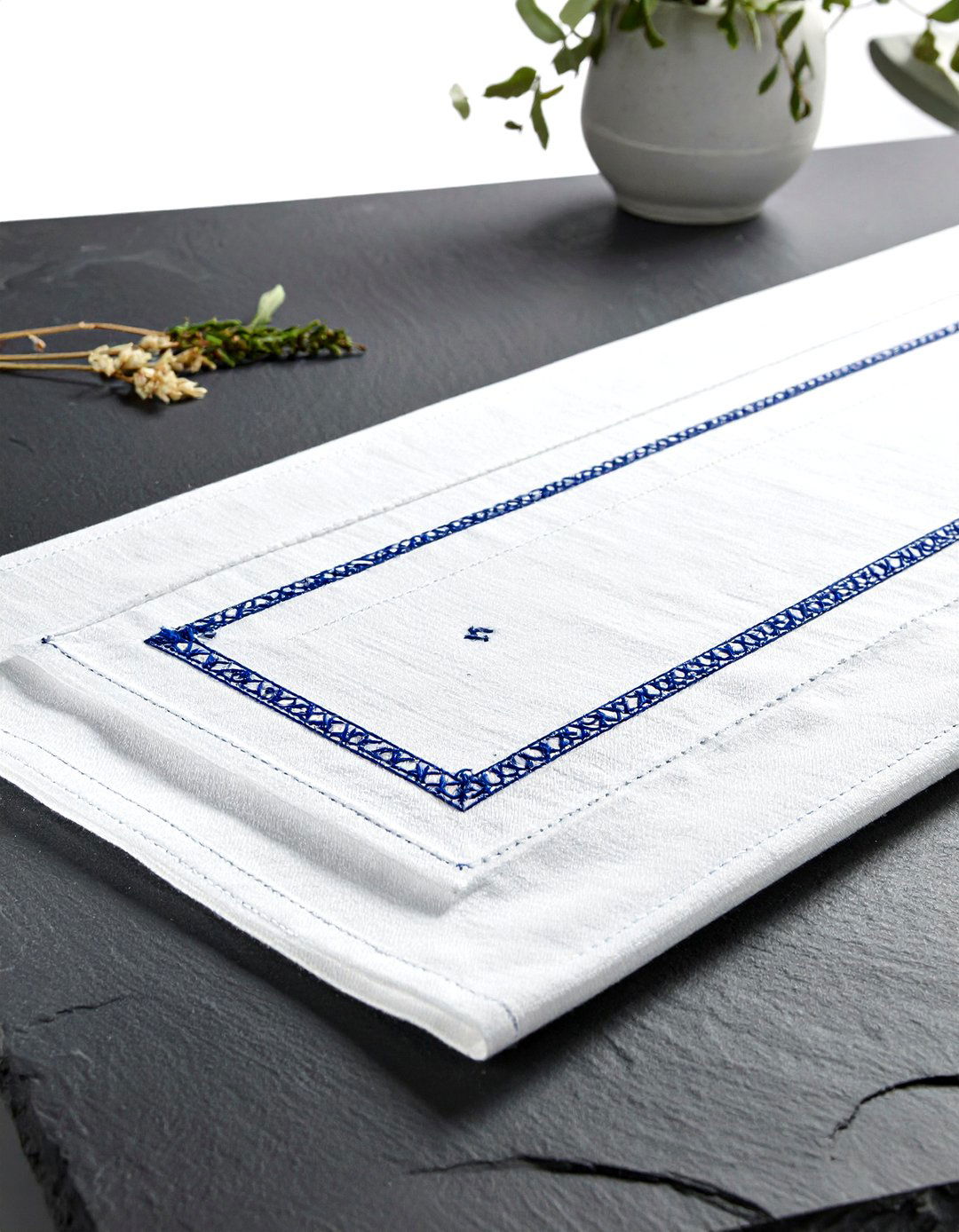 Embroidered Runner Slate Table - 30 dining room texture layering ideas