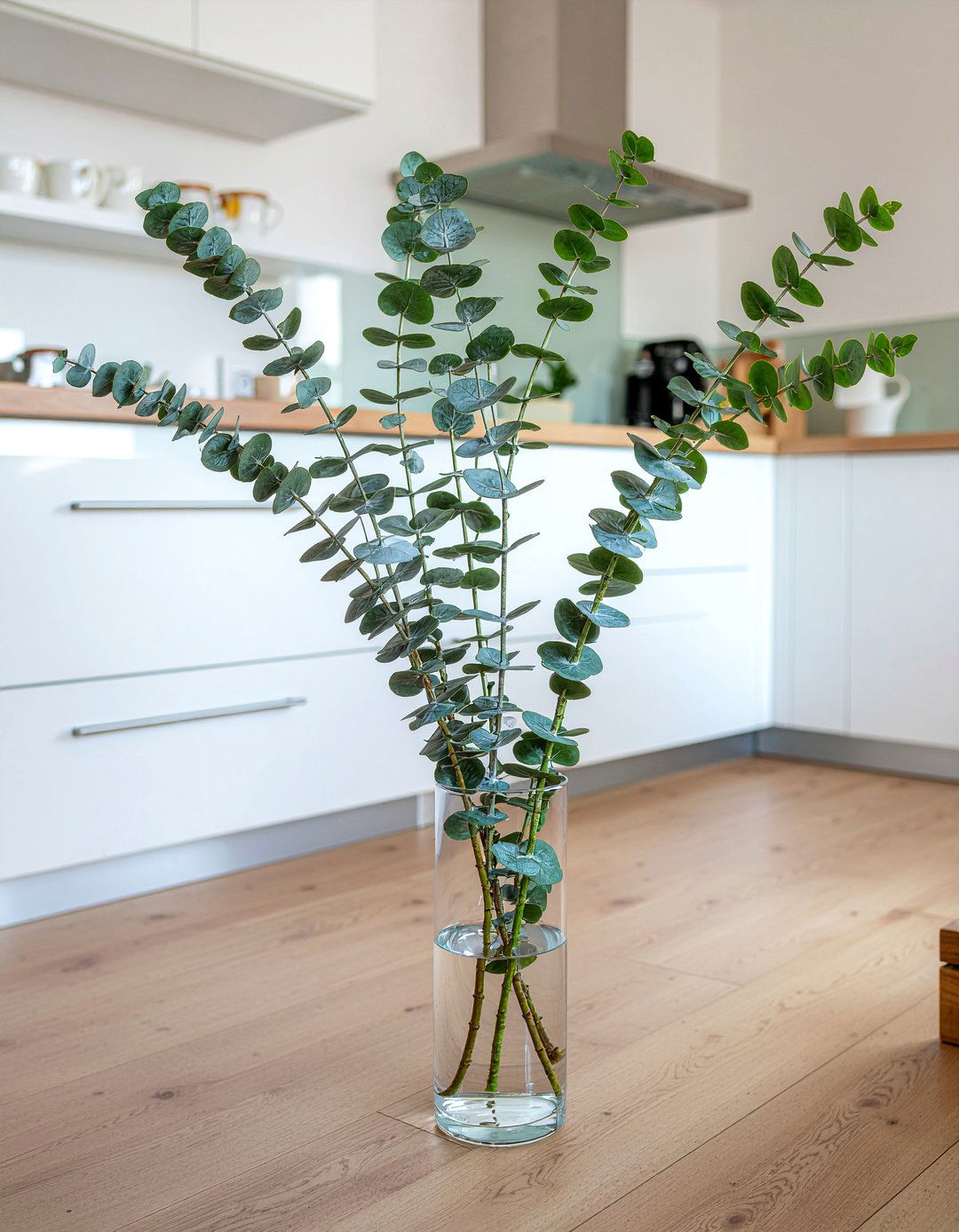 Eucalyptus kitchen branch decor - 30 kitchen flower arrangement ideas