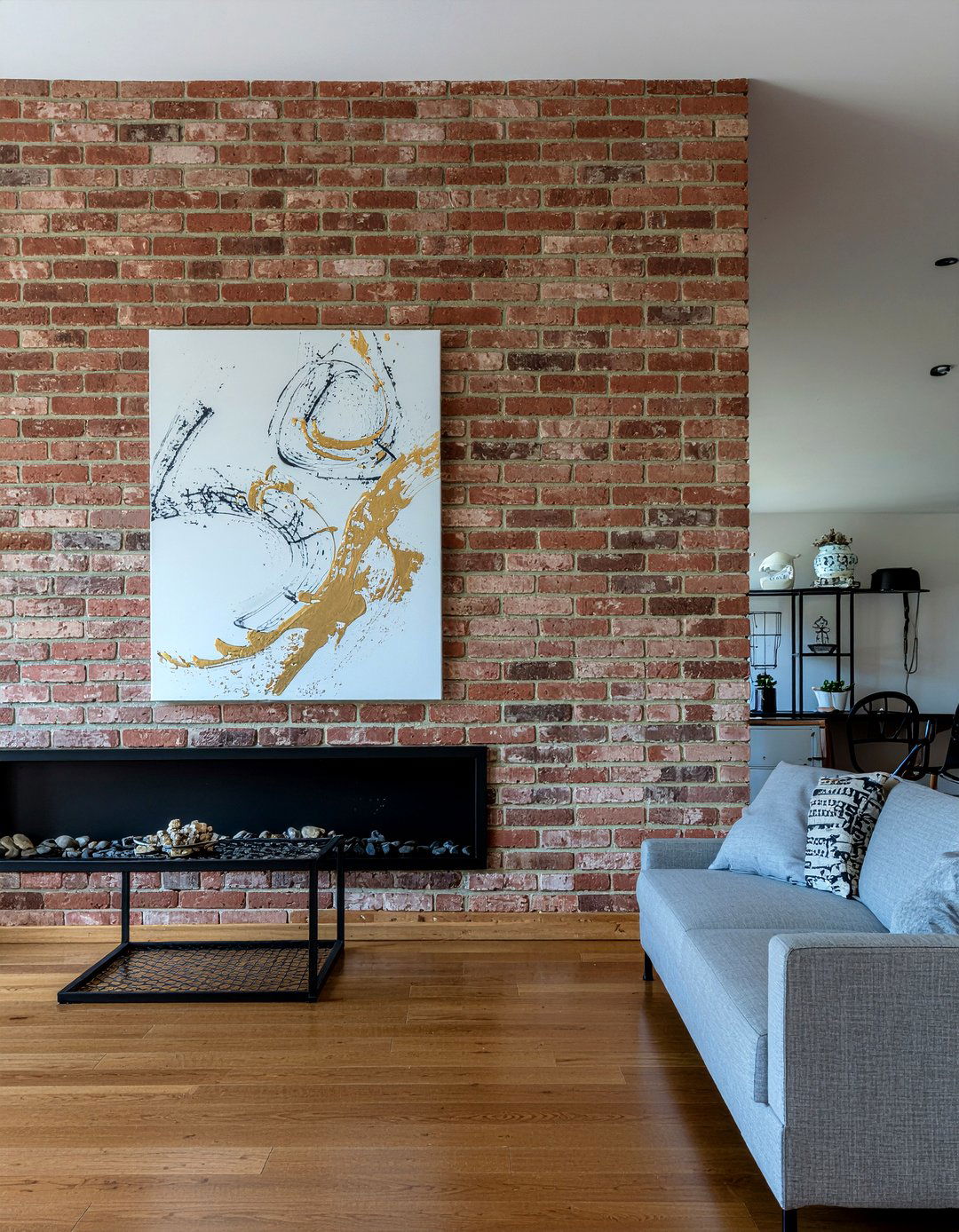 Exposed brick dark walls - 30 moody living room ideas