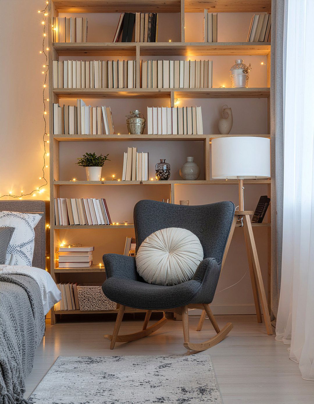 Fairy lights on bookshelf - 30 bedroom fairy lights ideas