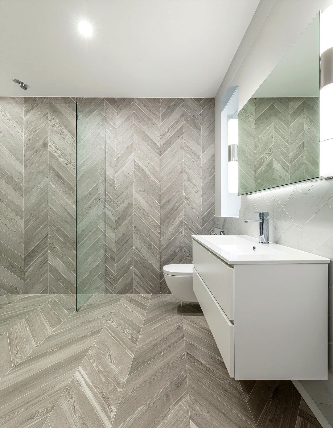 Floor to ceiling herringbone tile bathroom - 30 herringbone tile bathroom ideas