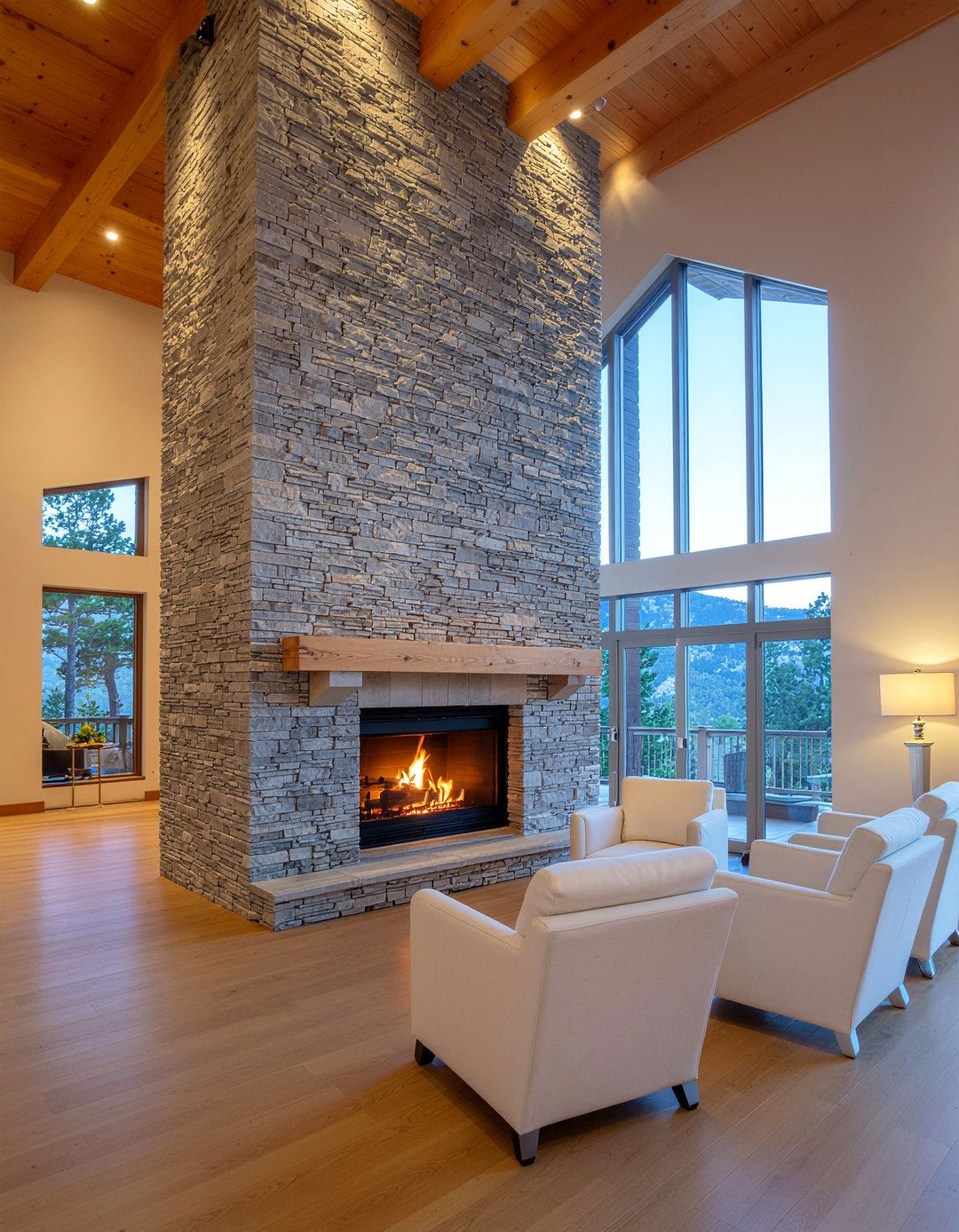 Floor to ceiling stone fireplace - 30 double height living room ideas