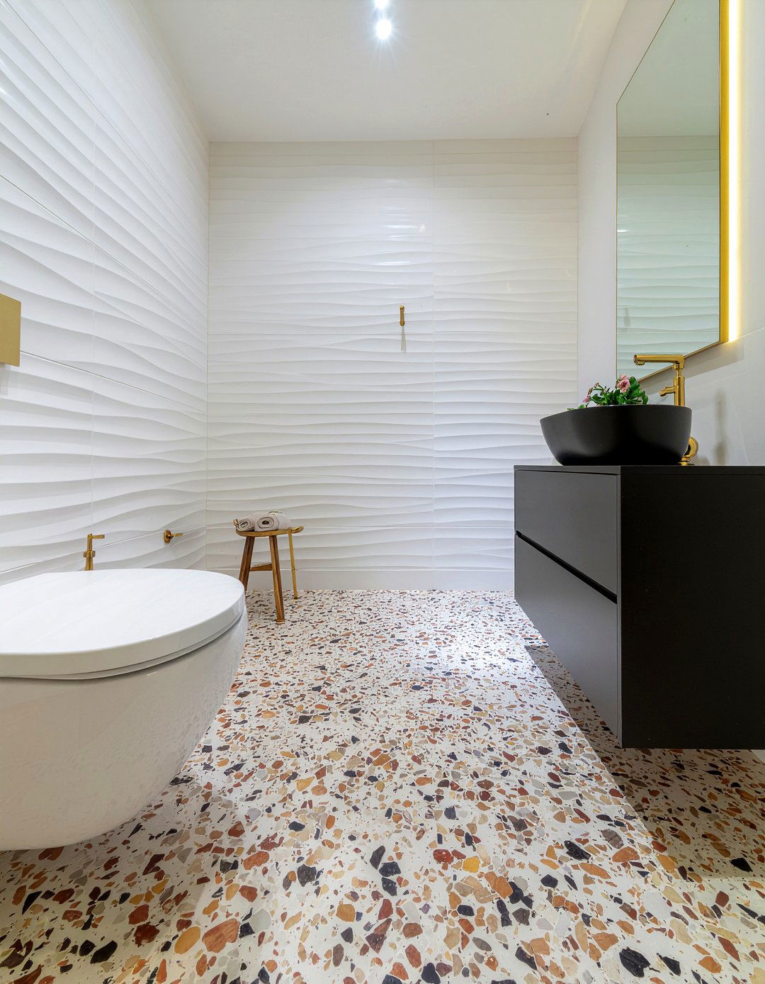 Fluted tile and terrazzo floor - 30 bathroom pattern mixing ideas