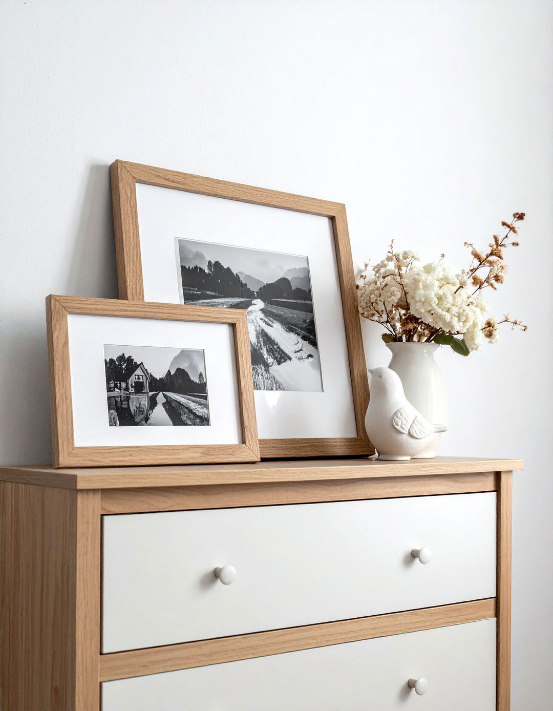 Framed photo dresser arrangement - 30 dresser vignette ideas