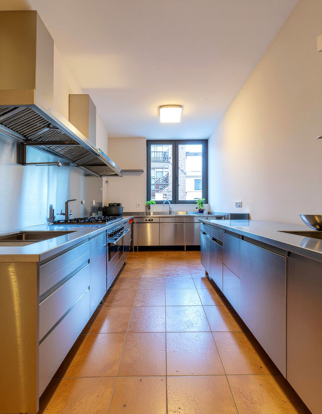 Galley kitchen with professional grade stainless steel - 30 architect designed kitchen ideas