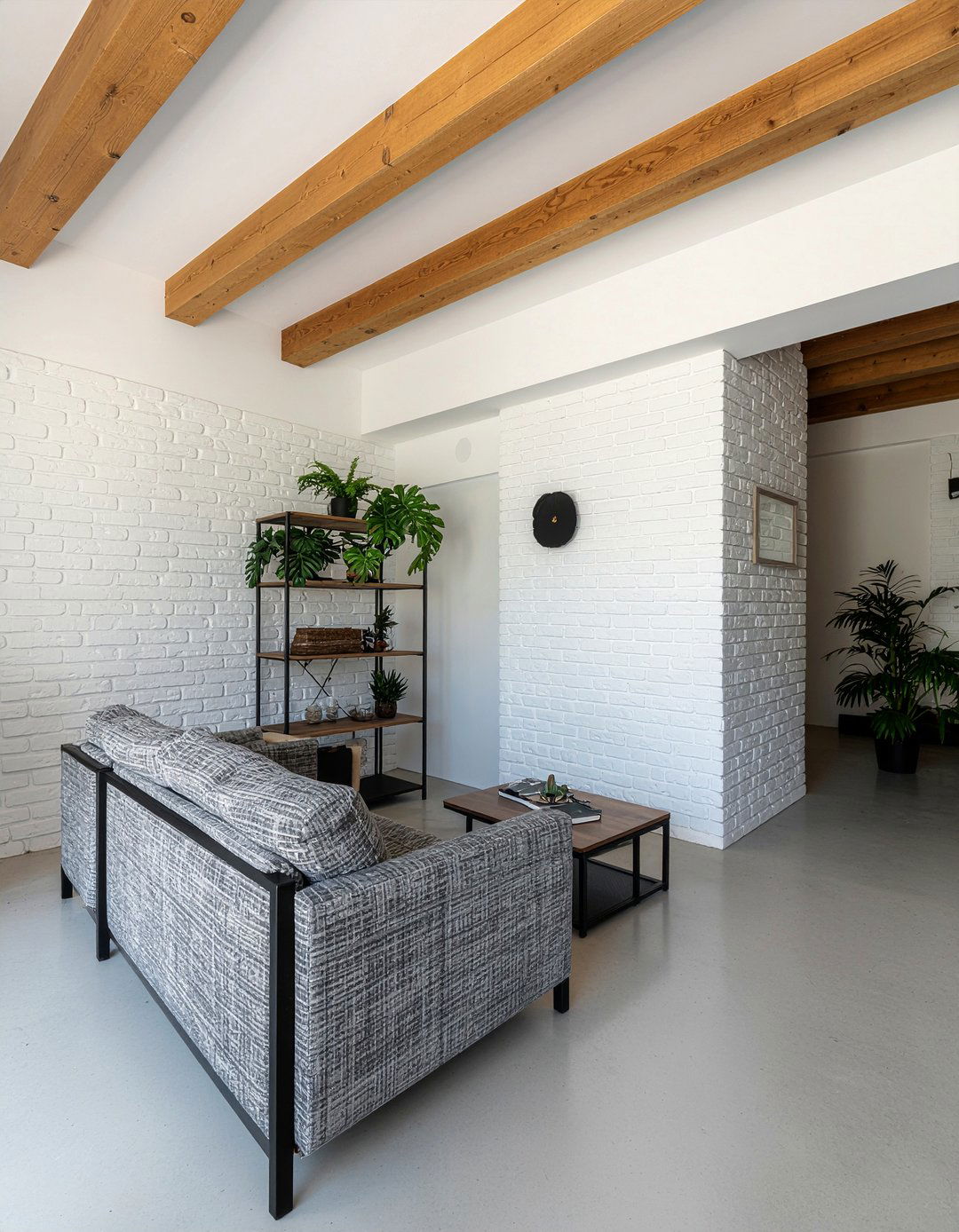 Garage living room with brick walls - 30 converted garage living room ideas