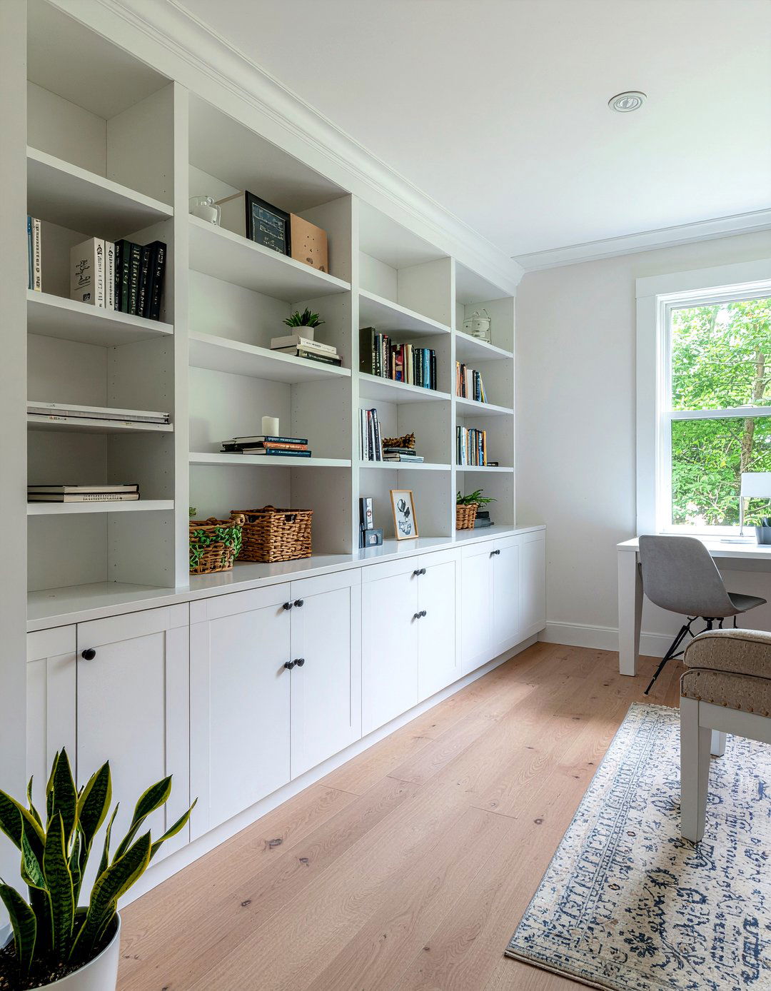 Garage living room with built in shelves - 30 converted garage living room ideas