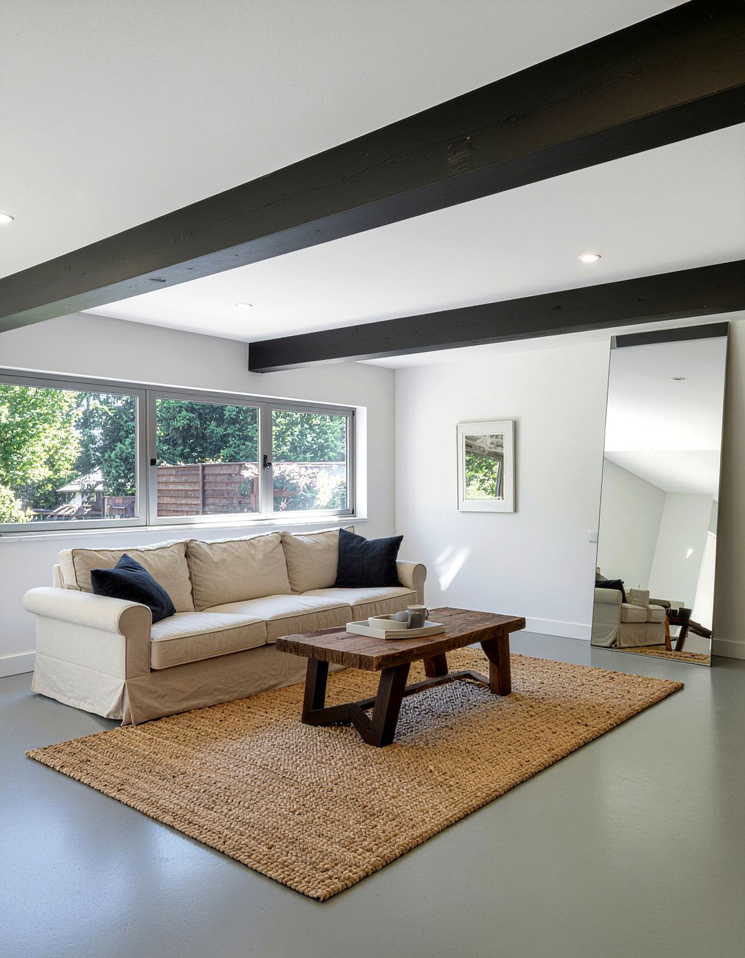 Garage living room with exposed beams - 30 converted garage living room ideas