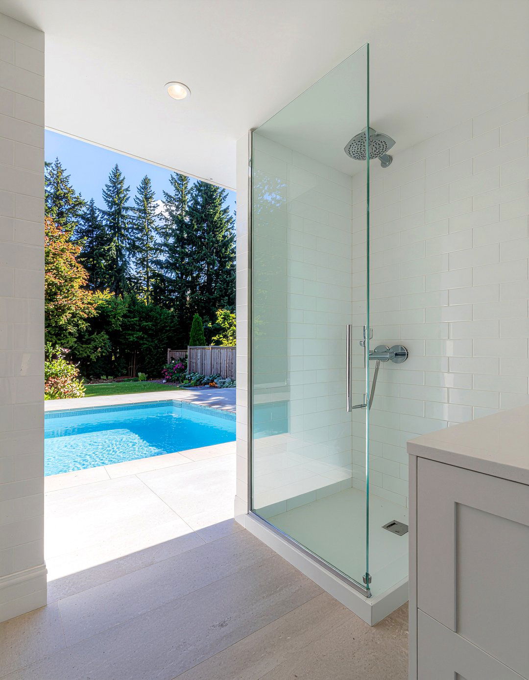 Glass door pool shower - 30 pool bathroom ideas