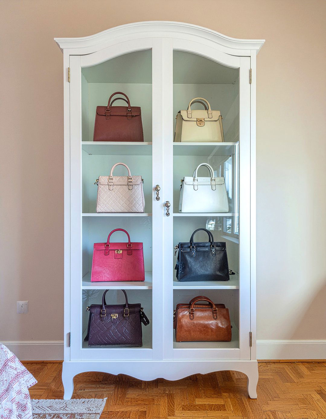 Glass front armoire - 30 bedroom bag storage ideas
