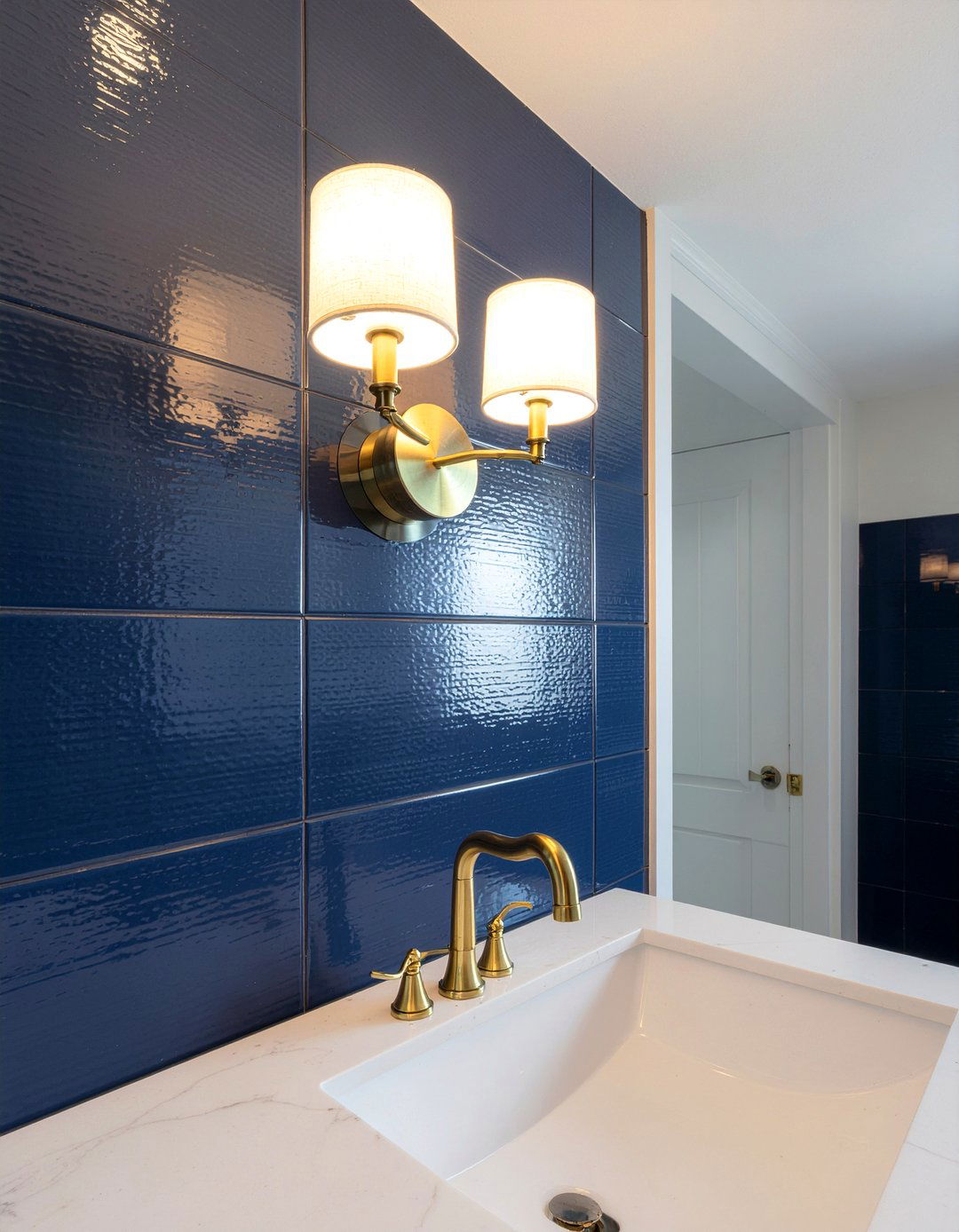 Gold finish sconce - 30 LED bathroom lighting ideas