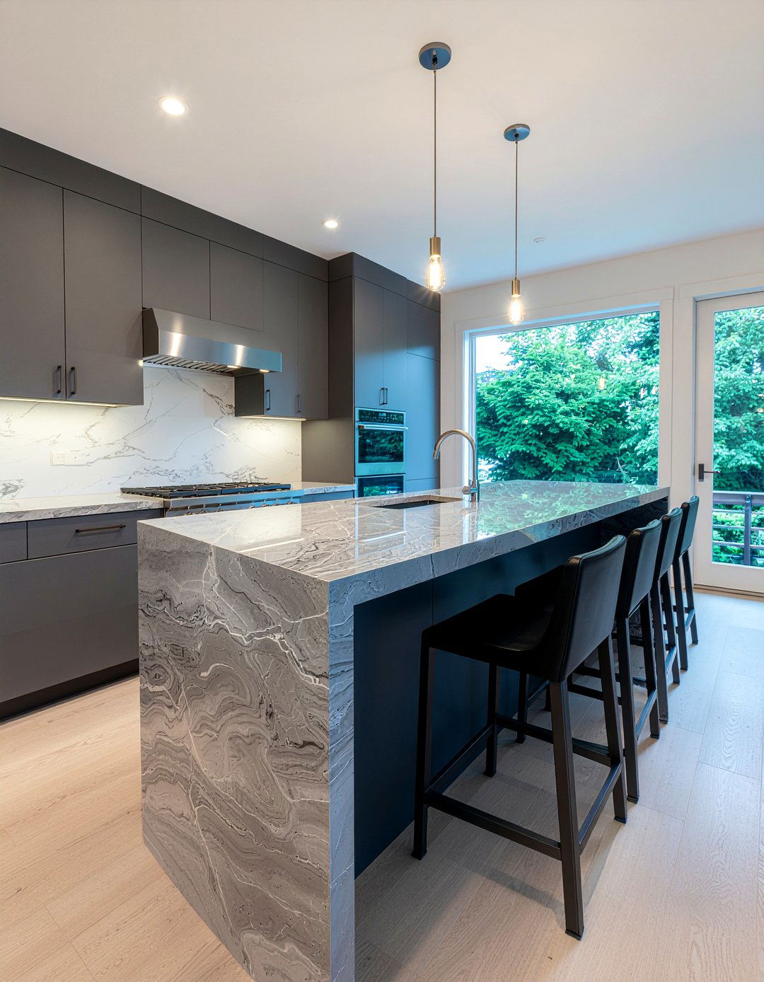 Gray waterfall island kitchen - 30 gray countertop kitchen ideas