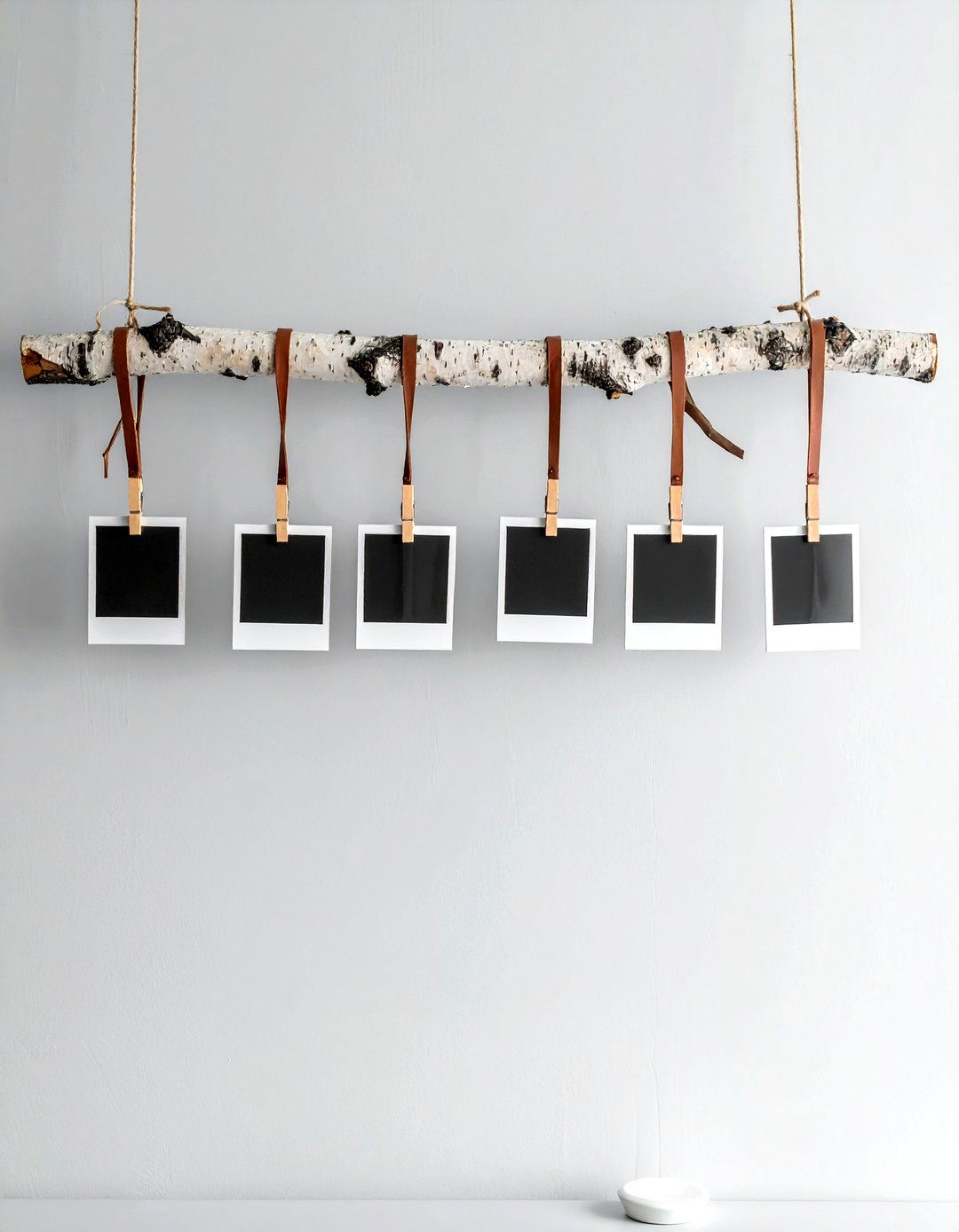 Hanging Branch Photo Display - 30 branch decor ideas