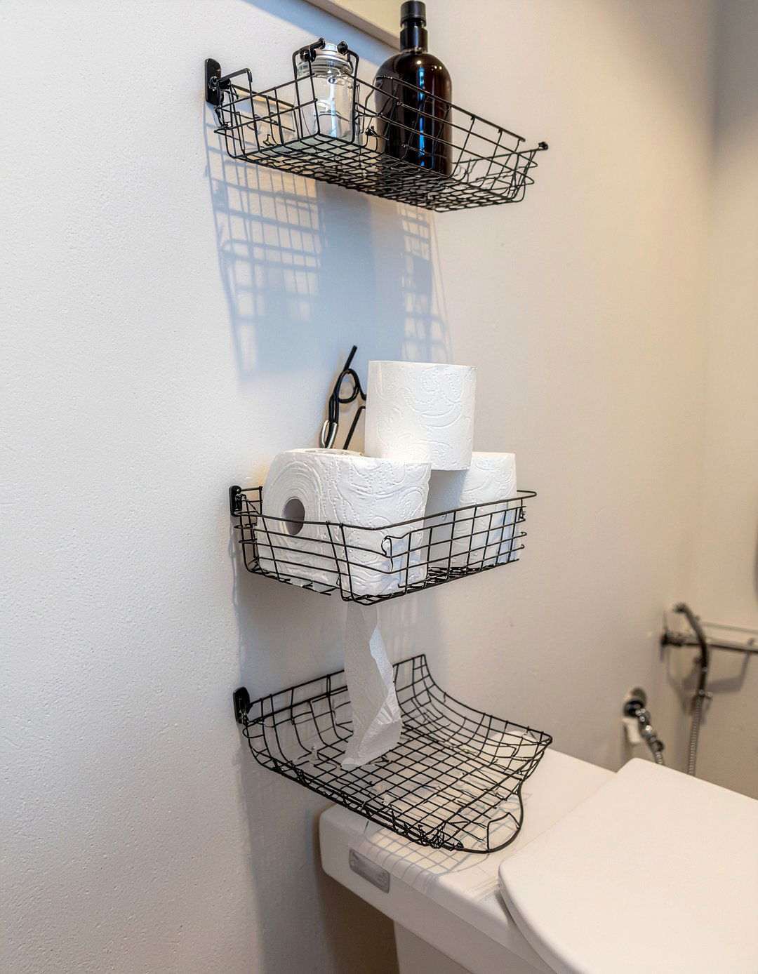 Hanging basket organizer - 30 over toilet storage ideas