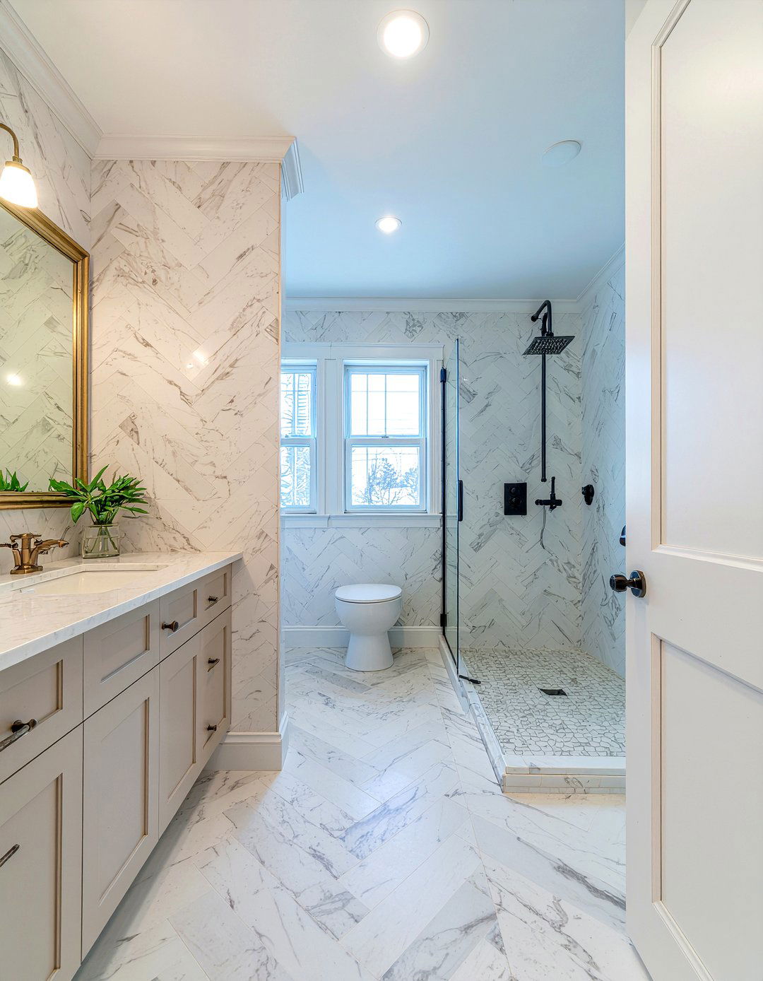 Herringbone Marble Wall - 30 marble tile bathroom ideas