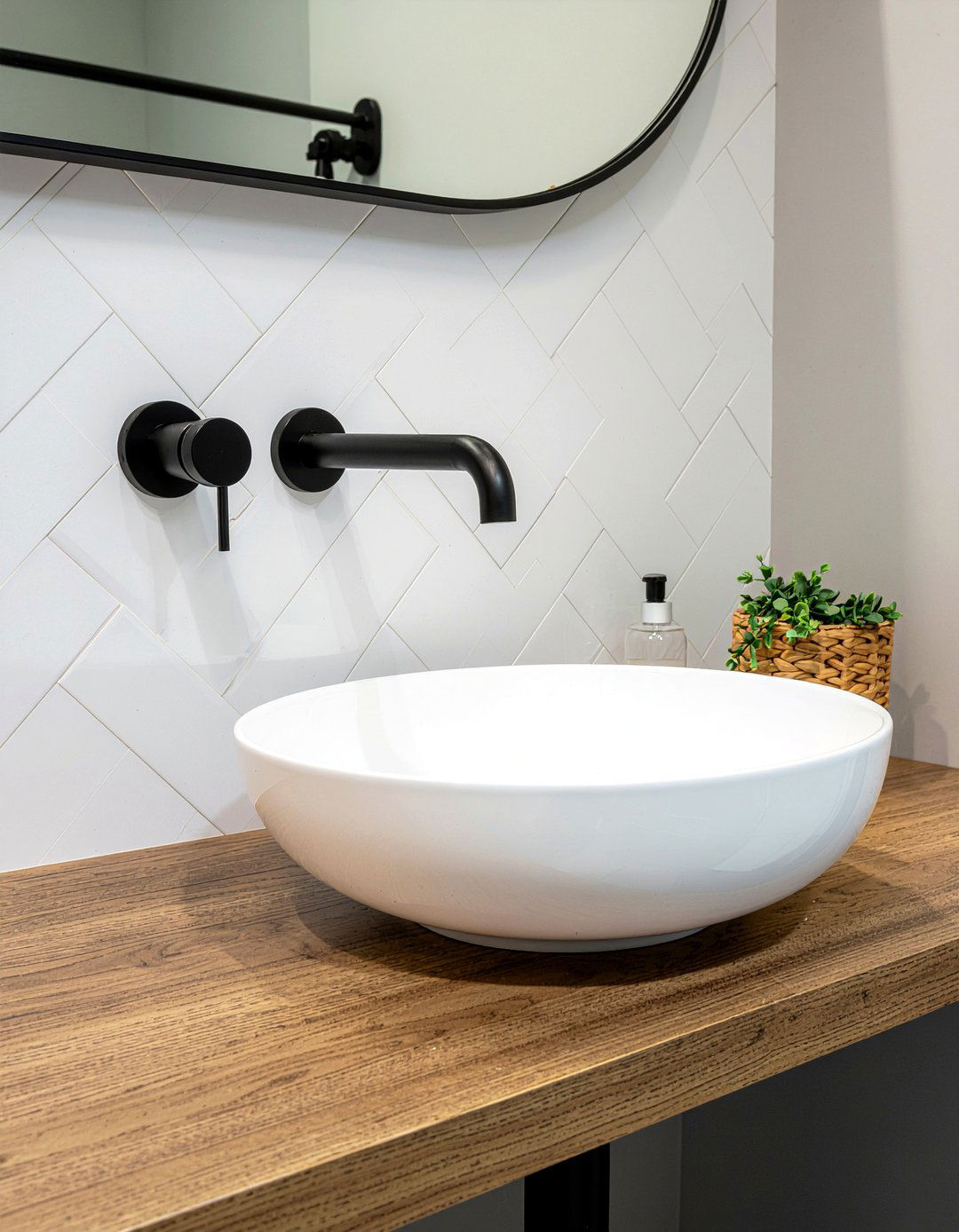 Herringbone vanity backsplash tile - 30 partial bathroom remodel ideas