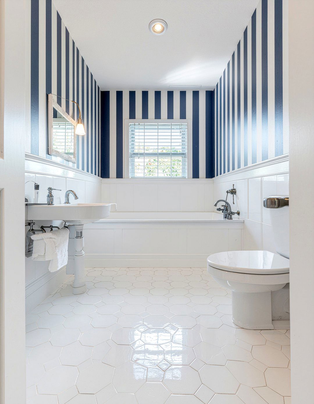 Hexagon tile and striped wallpaper - 30 bathroom pattern mixing ideas