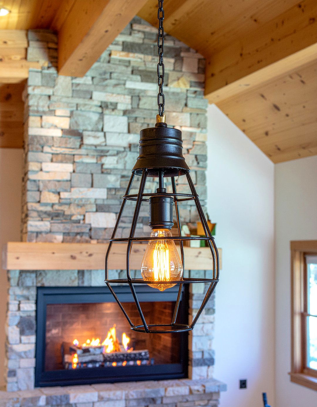 Iron Light Fixture - 30 lodge living room ideas