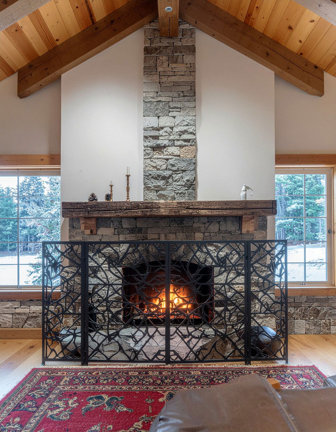 Iron fireplace screen - 30 metal accent living room ideas