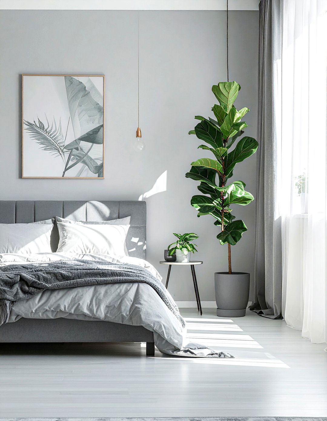 Large leafy indoor plant - 30 scandinavian grey bedroom ideas