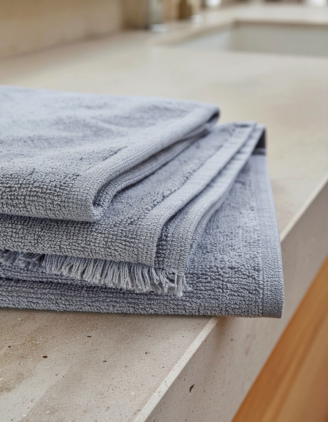 Linen hand towel stack - 30 bathroom countertop styling ideas