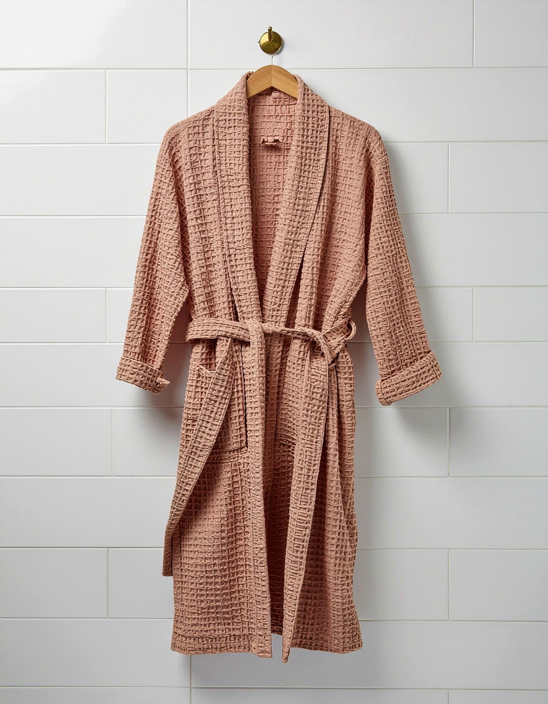 Linen robe on wall hook - 30 bathroom layering ideas