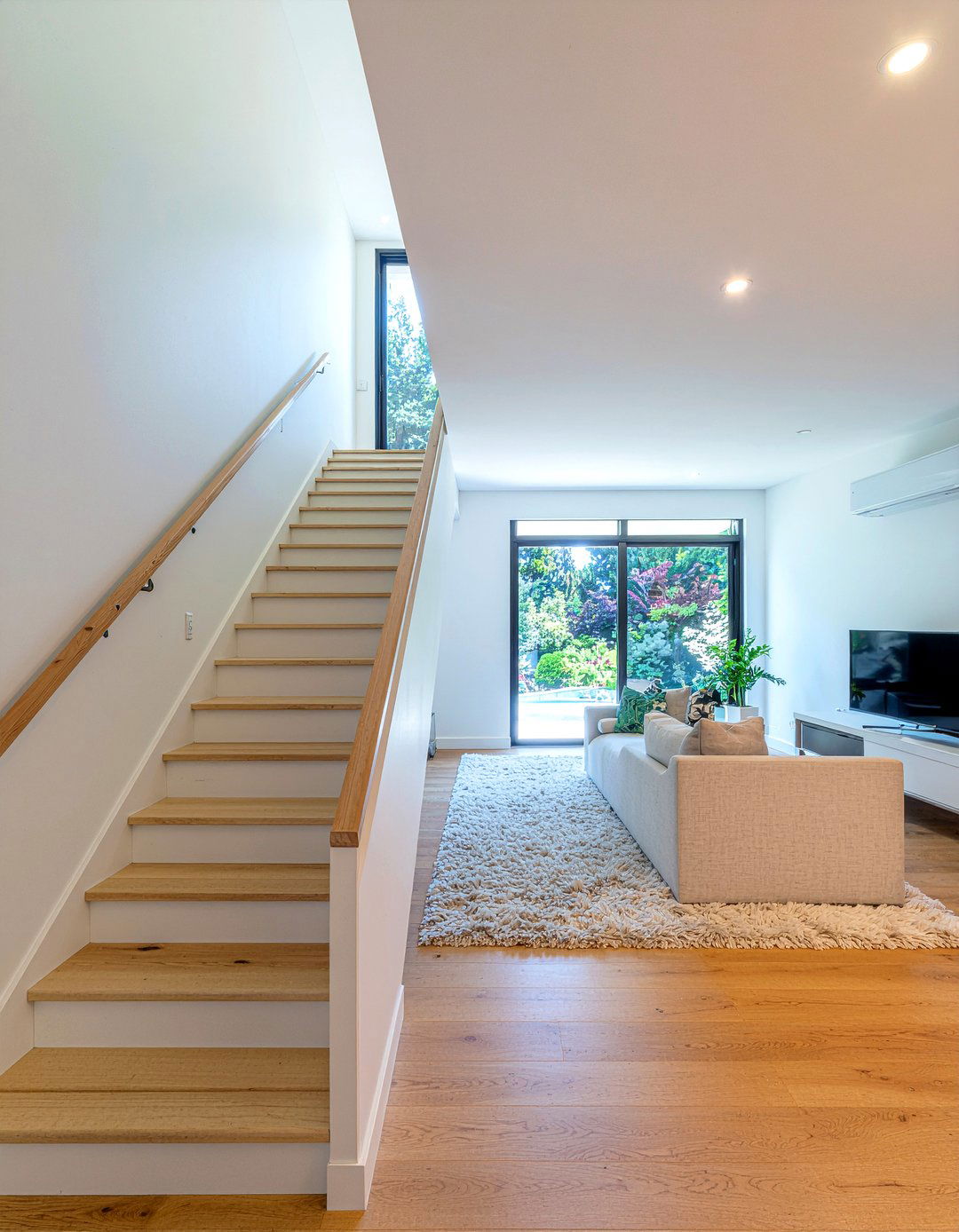 Living room stairwell pony wall - 30 living room pony wall ideas